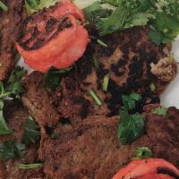 Lamb Kebabs · Gluten-free. Ground Ozzie lamb cooked with exotic spices on the grill and served with aromat...