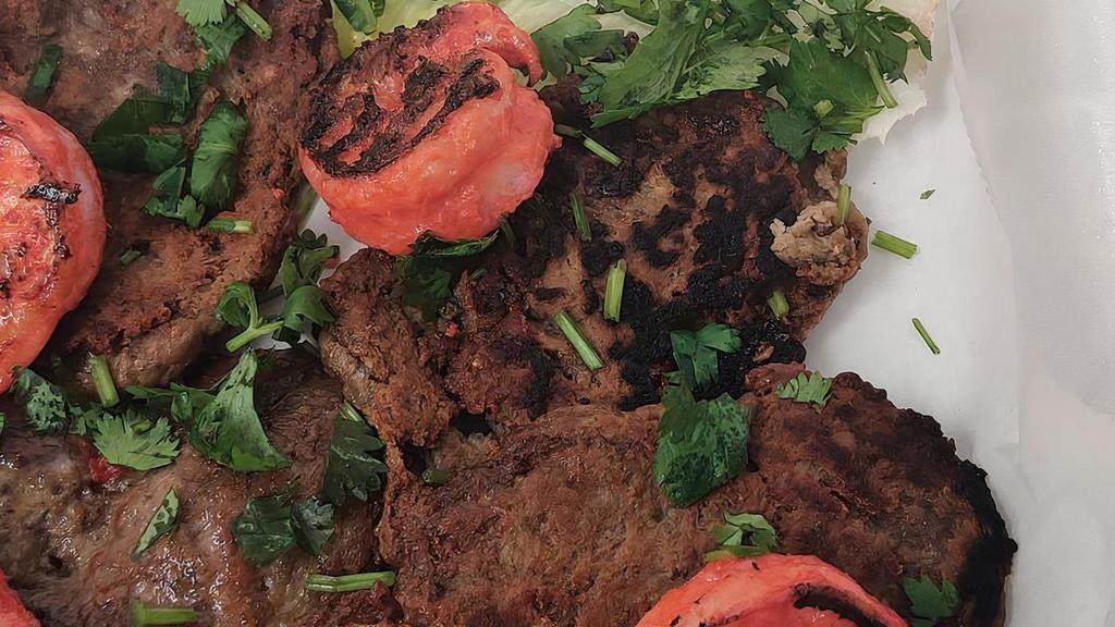 Lamb Kebabs · Gluten-free. Ground Ozzie lamb cooked with exotic spices on the grill and served with aromatic basmati rice and raita.