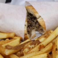 Philly Cheesesteak · Grilled sliced steak and onions with mayo and provolone cheese on a hoagie.