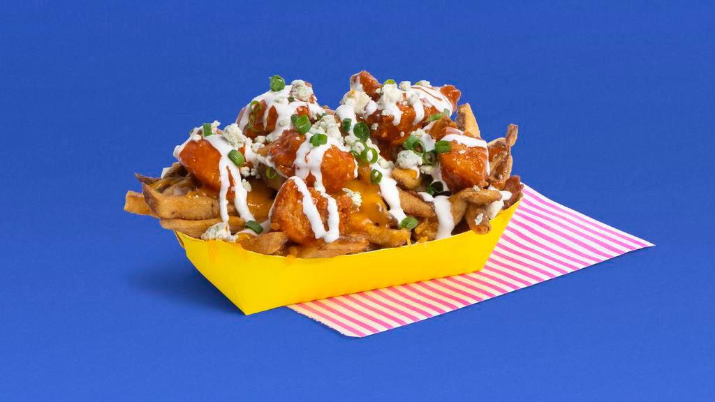 Buffalo Fries · French fries topped with fried chicken pieces, buffalo sauce, shredded cheese, blue cheese dressing, and scallions.