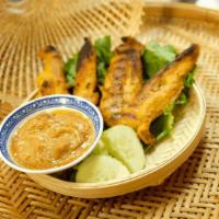 Chicken Satay · Thai chicken BBQ, grilled and served with homemade peanut sauce and cucumber sauce.