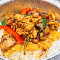 B12 Basil Chicken With Jasmine Rice · Stir fried ground chicken, bell peppers, mushrooms, Thai basil, and with house basil chili s...