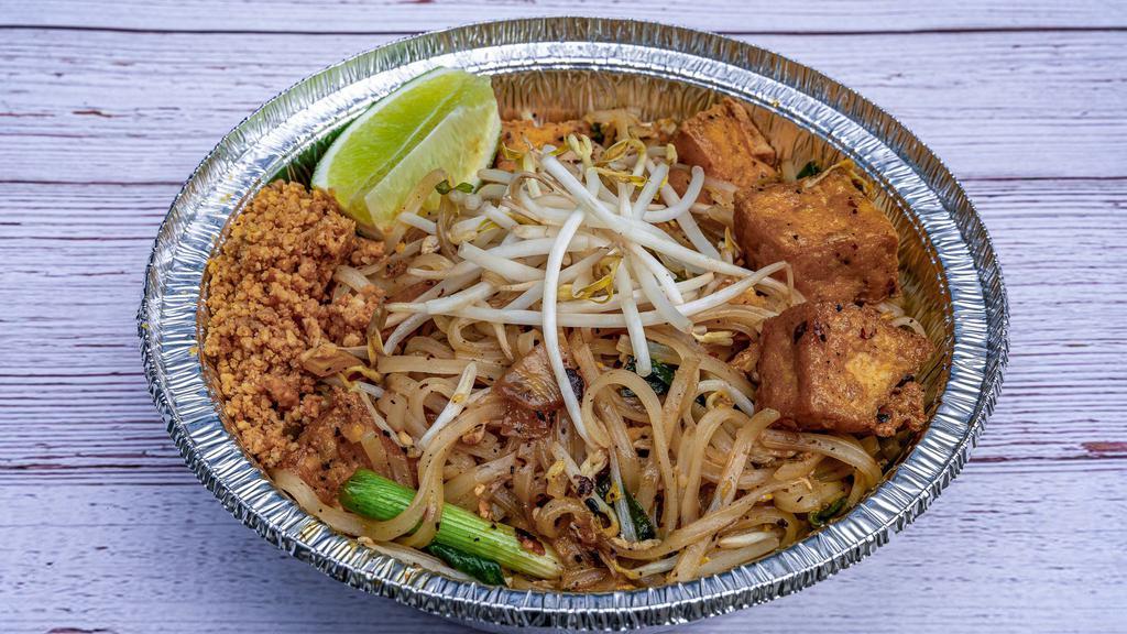 B2 Tofu Pad Thai · Sweet and Sour stir fried thin rice noodles with Tofu, eggs, green onions, bean sprout, and pickle radish. Serve with lime and crush peanut on the side.