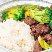 B15 Beef Broccoli And Jasmine Rice · Beef and  broccoli crown  in house brown sauce. Serve with Jasmine rice.