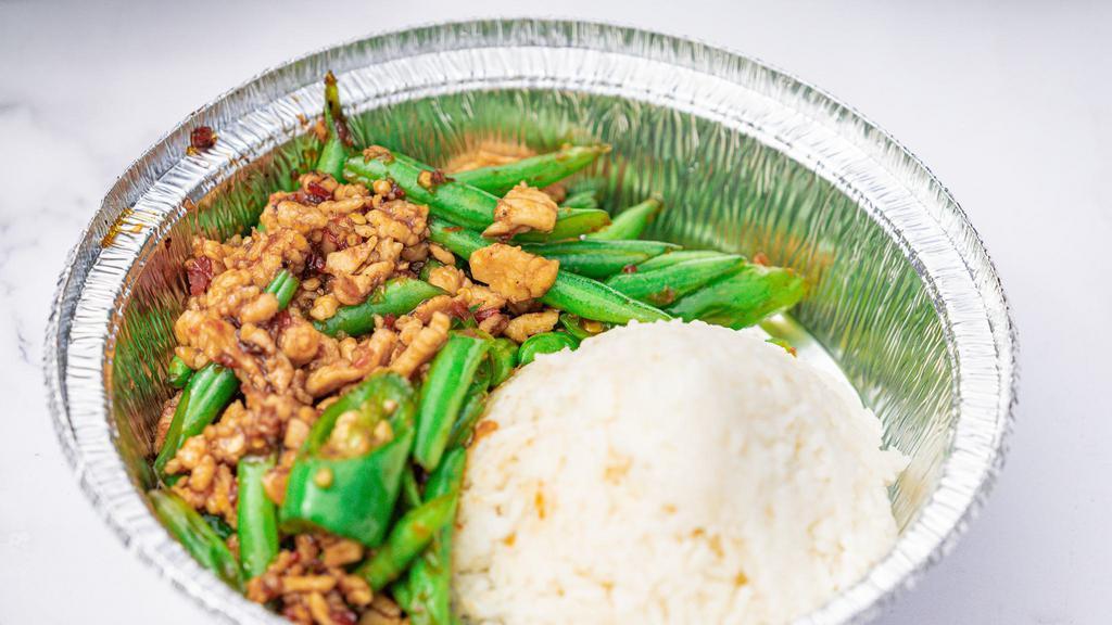 B18 Spicy Green Bean Chicken And Jasmine Rice · Ground chicken stir fried with green bean, and house basil chili paste sauce. Serve with Jasmine rice.