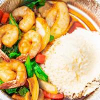 B14 Shrimp (8) Vegetable Stir-Fried With Jasmine Rice · Shrimp stir fried with Gai Lan broccoli, yellow onion, and mushroom in house brown sauce. Se...