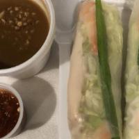 Shrimp Spring Rolls (2) · A delicate rice paper rolled around shrimp, shredded lettuce, cucumber mint, and steamed ric...