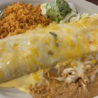 Burrito Grande · One beast of burrito! A large flour tortilla stuffed with refried beans, cheese, and your ch...