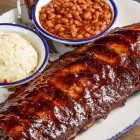 Baby Back Ribs · BBQ Glazed.  Served with Two Sides.