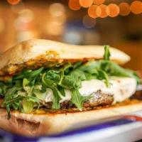 Grilled Chicken · Pepper Jack Cheese, Arugula and Sun-Dried Tomato Pesto on Ciabatta Bread.  Served with one s...