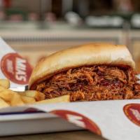 Pulled Pork · With BBQ Sauce on a Mia's Bun.  Served with One Side.