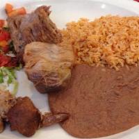 Carnitas · Tender pieces of fried pork served with Rice& beans and pico de Gallo& guacamole