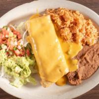 Chimichanga · large flour tortilla stuffed your choice of meat fried served chilli con queso  rice and bea...