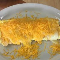 Three Cheese Omelet · Filled with cheddar, swiss and American
cheese.
