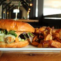 Chicken Cali Sandwich · Grilled chicken breast and avocado, topped with cheddar cheese, arugula, and chipotle aioli.
