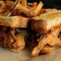 Brisket Melt · House made beer braised beef brisket served on grilled
sourdough with caramelized onions, wh...