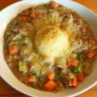 Grilled Steak Shepherd’S Pie · Grilled skirt steak served in a roux of simmered 
peas, carrots and onions in beef stock top...