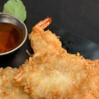Coconut Shrimp (5Pcs)                             · Deep fried jumbo shrimp in a crunchy shredded coconut batter served with our homemade sweet ...