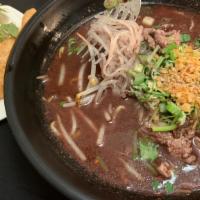 Bangkok Boat Noodle   · Thin rice noodles in Bangkok style beef broth, served with vegetables