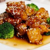 Sesame Chicken · Tossed in sweet wine sauce topped with roasted sesame seeds served with steamed broccoli