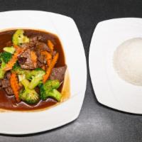 Beef Broccoli · Stir fried beef or chicken and broccoli in Thai garlic brown sauce