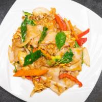 Pad Kee Mow                                    · Stir fried big flat noodles with egg, carrots, bell peppers, onions, scallions, and fresh ba...