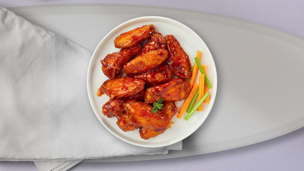 Buffalo Chicken Wings · Fresh chicken wings breaded, fried until golden brown, and tossed in buffalo sauce.