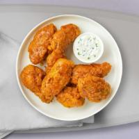 Mango Habanero Wings · Fresh chicken wings breaded, fried until golden brown, and tossed in lemon pepper sauce.