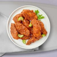 Cayenne Pepper Wings · Fresh chicken wings breaded, fried until golden brown, and tossed in lemon pepper sauce.