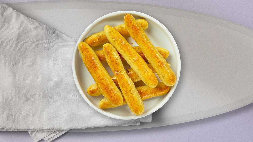 Cheese Breadsticks  · Twelve sticks of crisp, baked cheese bread sticks from Italy. Served with ranch sauce.