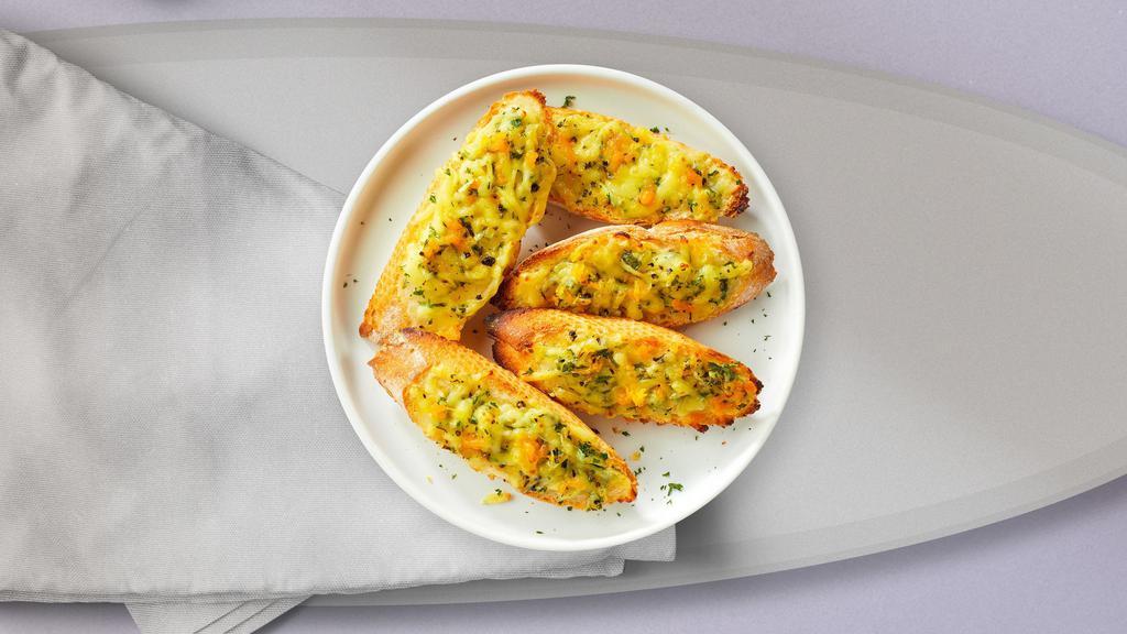 Garlic Bread With Cheese · (Vegetarian) Housemade bread toasted and garnished with butter, garlic, mozzarella cheese, and parsley.