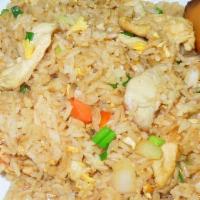 Fried Rice · Peas, green onion, choice of meat chicken or beef or shrimp, carrots, onion.