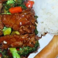Dragon Delight · Chicken, beef, shrimp, fresh mix vegetables, white rice and egg roll.