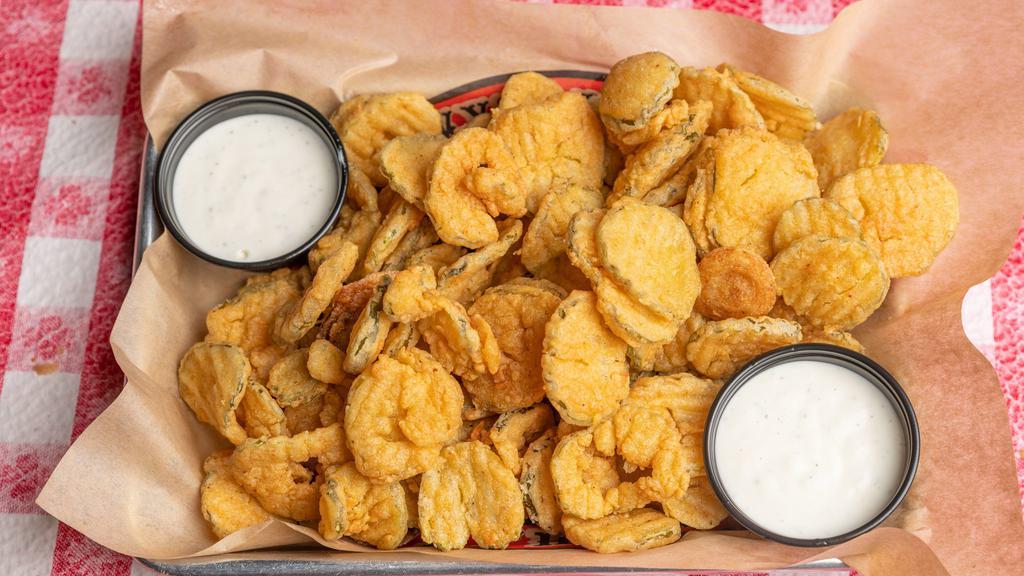 Fried Pickles · Battered, deep fried and served with ranch dressing.