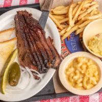 Sliced Brisket Platter · A prime cut of lean beef brisket, rubbed with Riscky's Dust and smoked slowly over a wood fi...