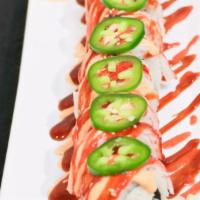 Ultimate Chilli Roll · Spicy Crab, Avocado, Cucumber, spicy mayo, Eel Sauce, Sriracha, and crab stick & Jalapeños o...