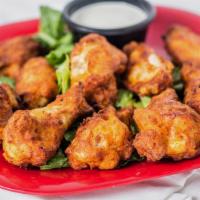 Sizzling Buffalo Wings · Baked not fried. Served with our ranch dressing.