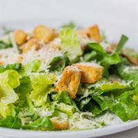 Caesar Salad · Tender hearts of romaine tossed with our special caesar dressing and finished with romano, p...