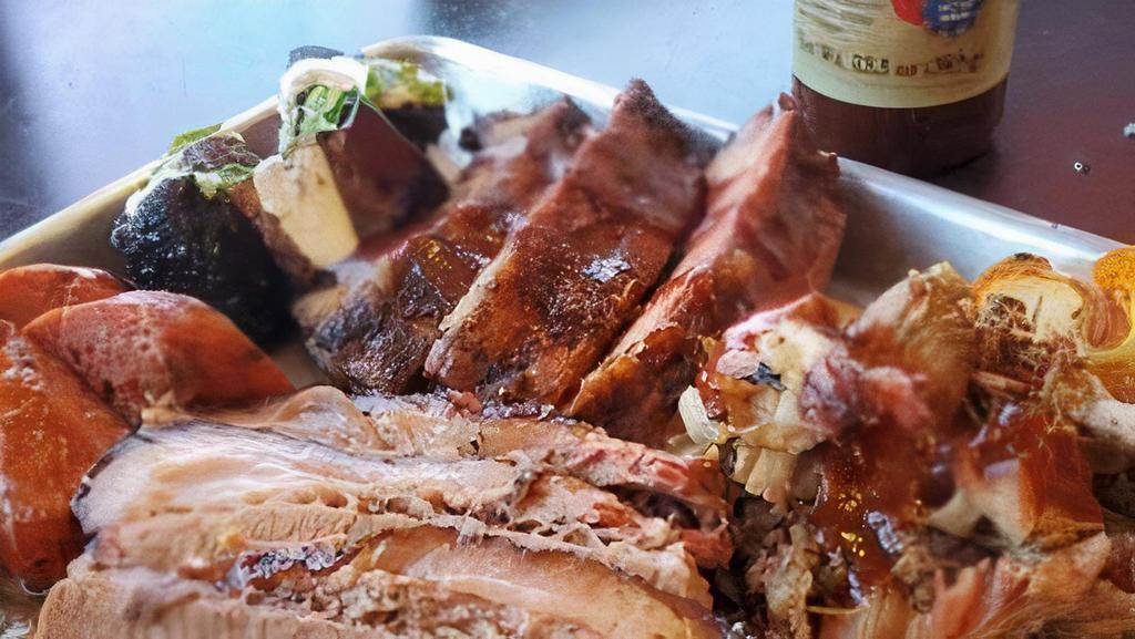 Burnt Sampler Pick 2 Sides · Signature 1/4# meats includes brisket, pulled pork, sausage and burnt ends, 3 St. Louis Style Pork Ribs plus 2 sides and TX Toast