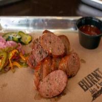 Smok'D Sausage 1/4# · House made signature sausage with a touch of roast'd poblano and some great seasonings.