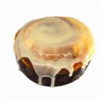 Cinnamon Roll · Soft cinnamon roll layered with butter crust and glazed with vanilla icing. (4