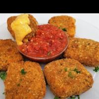 Mac & Cheese Bites · Cheesy elbow pasta breaded and oven fried & served w/Marinara sauce