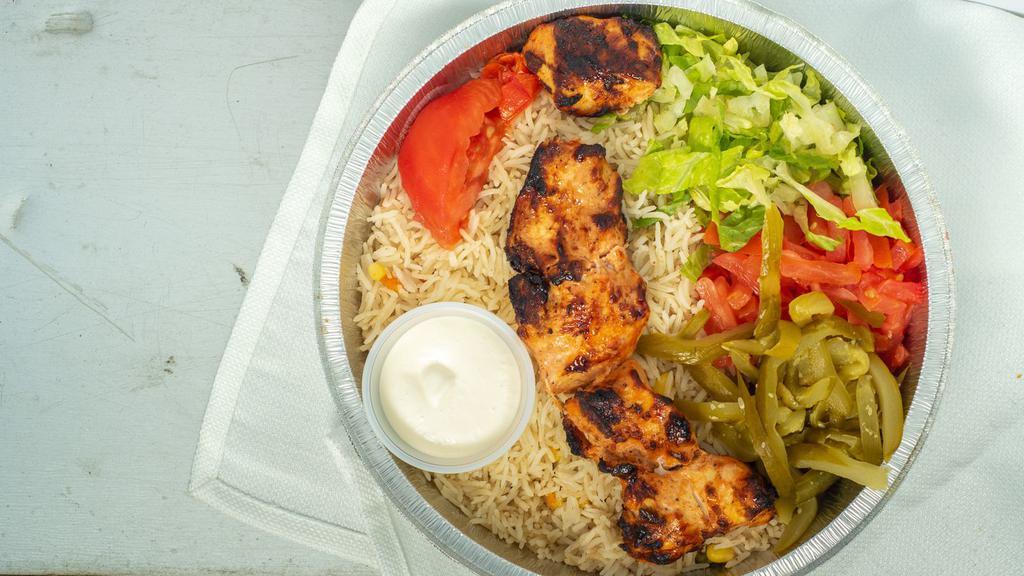 Chicken Kabob Plate · Basmati Saffron Rice | Grilled Chicken Kabob | Salad Mix | Pickles | Garlic Sauce