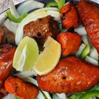 Mumtaz Tandoori Platter (For 2) · Combination of chicken tikka, seekh kebab & tandoori chicken wings.