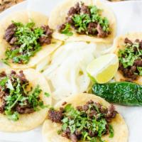 Street Tacos · Five street tacos choice of steak, barbacoa, carnitas, al pastor, or chicken. Served with gr...