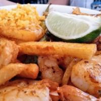 Diabla Shrimp · Grilled shrimp tossed in our spicy salsa, with grilled onions and bell pepper. Served with r...