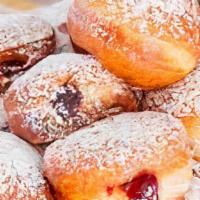 Filled Donut · Choice of glazed or chocolate covered donut with a filling choice of Bavarian cream, raspber...