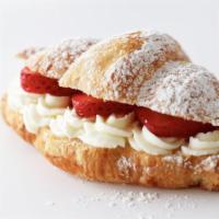 Strawberries & Cream Croissant · Dessert croissant with strawberries and fresh cream.