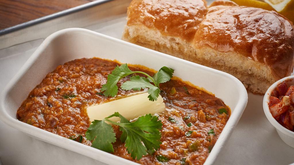 Bhaji Pav · Our signature spiced vegetable and potato mash served with warm buttered pav.