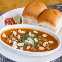 Honest Sp. Bhaji Pav · Our signature spiced vegetable and potato mash with cashews and raisins served with warm but...